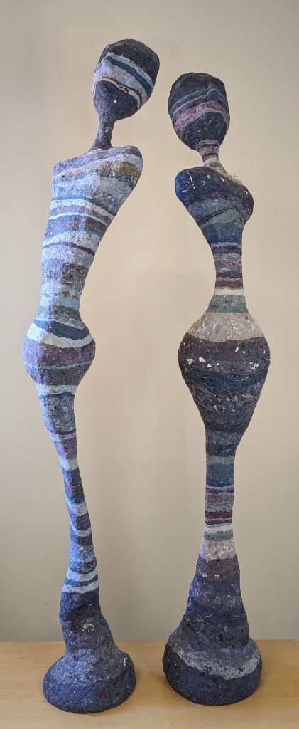 Two striped sculptures